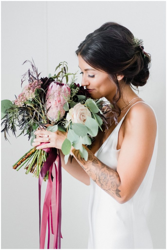 Boho bouquet with protea and herbs by Mint and Magnolia Floral Design, photographed by Jenn Kavanagh Photography
