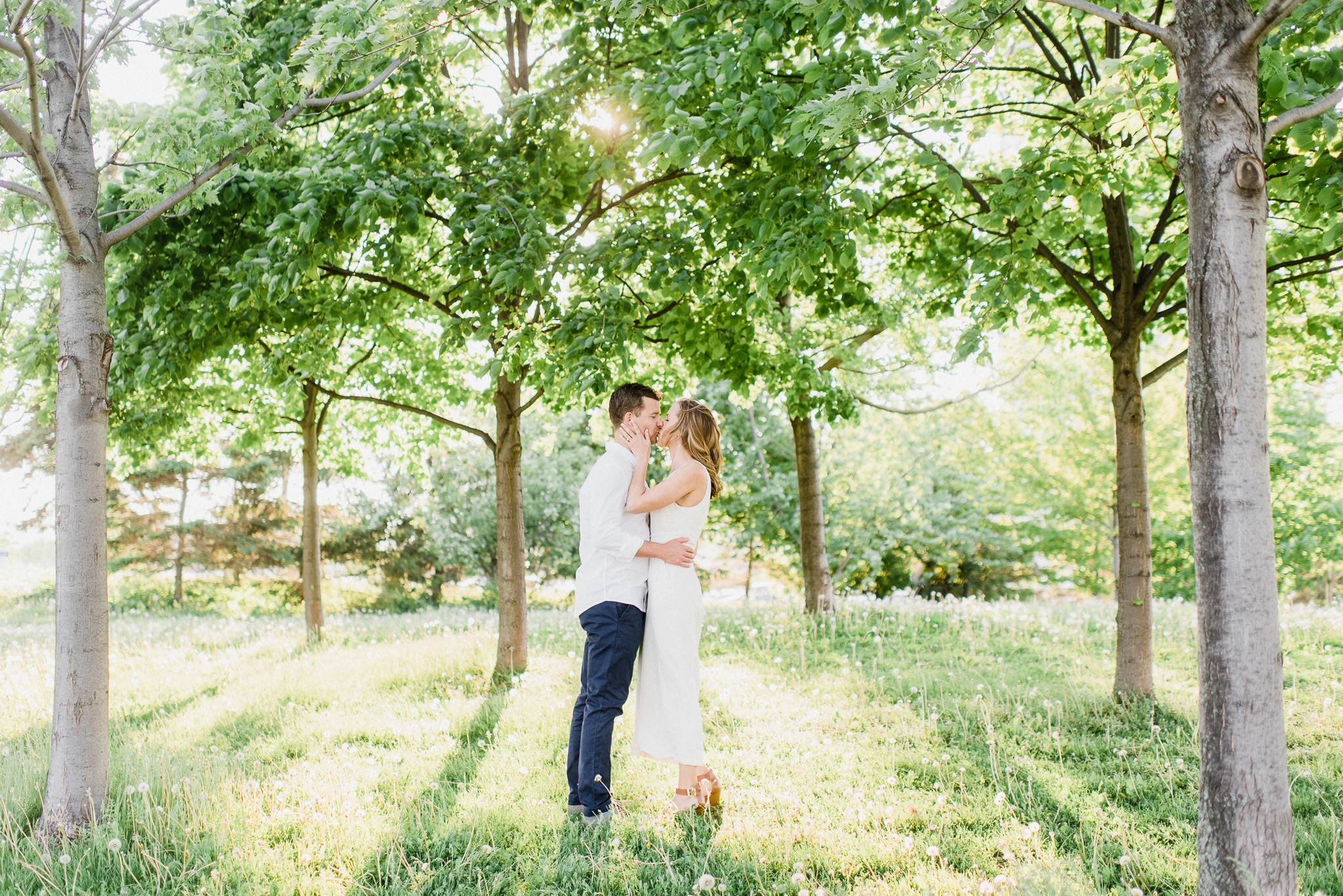 Gorgeous bride-to-be in elegant white jumpsuit, photographed by Jenn Kavanagh Photography.